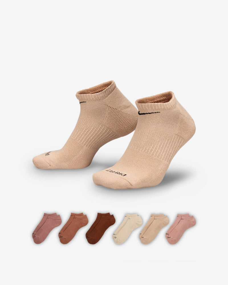 Nike Everyday Plus Cushioned No Show Socks in beige with ribbed arch support and Dri-FIT material, side angle and multi-color options.