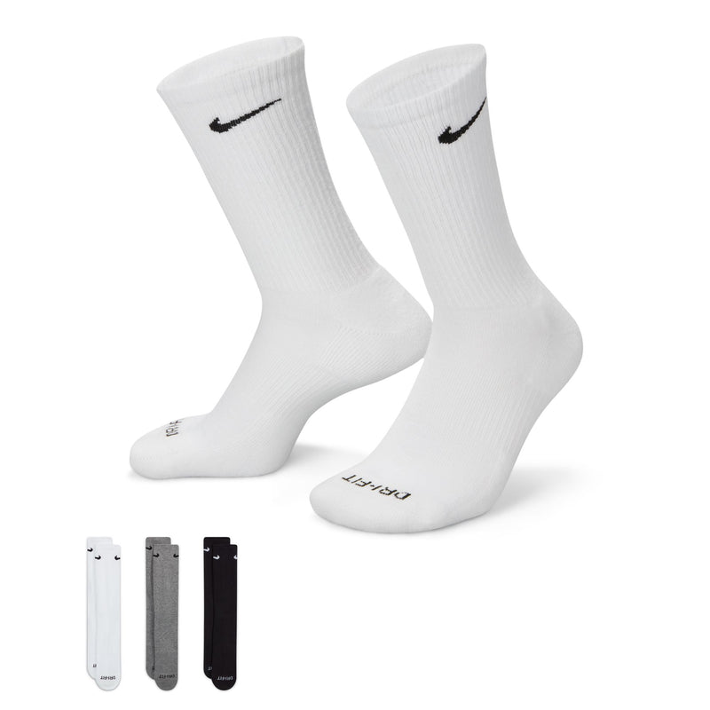 Nike Everyday Plus Cushioned Training Crew Socks in white with black Swoosh logo, ribbed cuffs, and Dri-FIT technology, side angle.