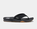 Reef Fanning Flip Flops in black with synthetic upper, contoured footbed, and bottle opener in sole, side view.