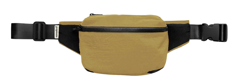 Nomadix Fanny Pack in mustard yellow with black adjustable straps, durable fabric, and zippered main compartment, front view.
