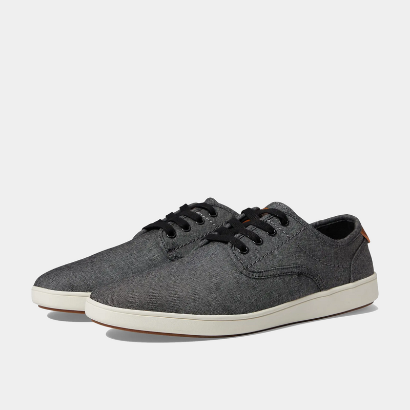 Steve Madden Fenta casual shoes in gray canvas with black laces and white rubber sole, angled front-side view.