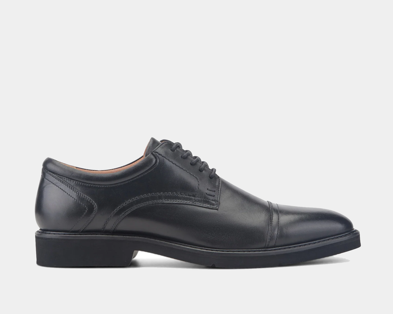 Rockport Findlay Lace-up Almond Toe Oxfords in black leather with sleek stitching and lace closure, side view.