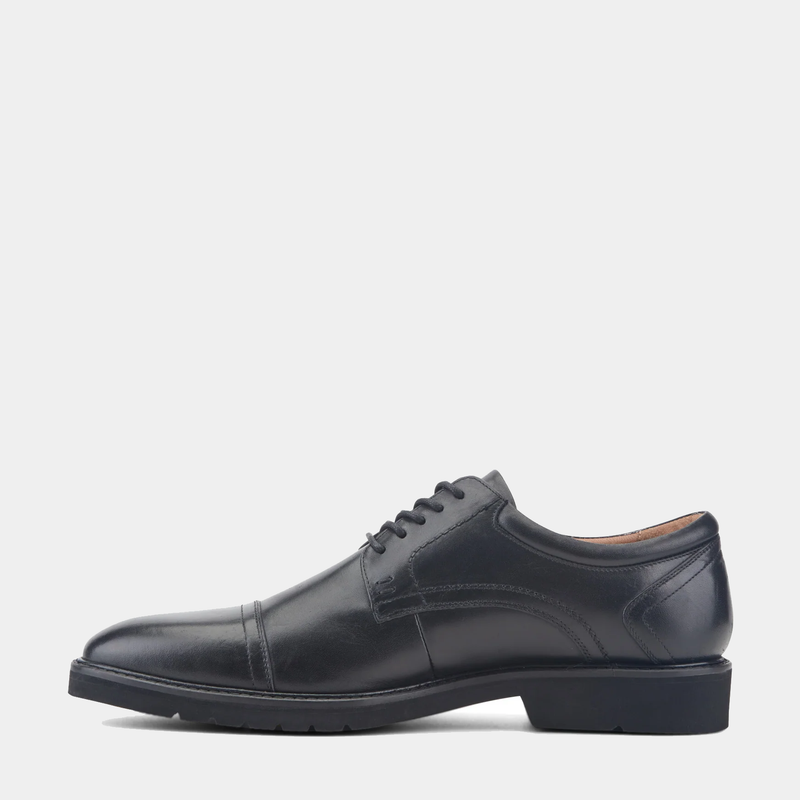 Rockport Findlay Lace-up Almond Toe Oxfords in black leather with stitched detailing and durable outsole, side view.