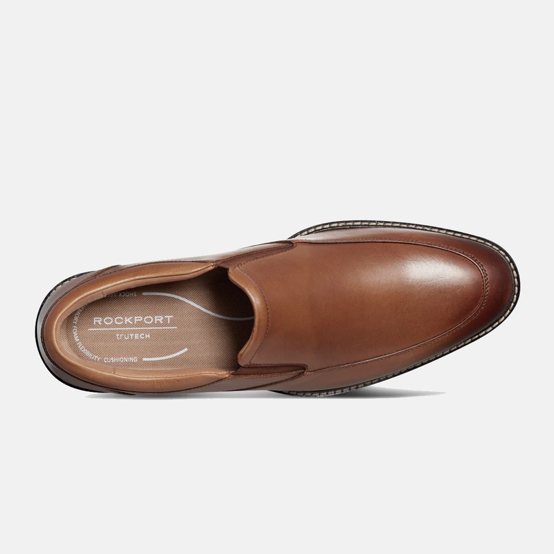 Rockport Folton Almond Toe Slip On dress shoes in brown leather with cushioned insole, top view.