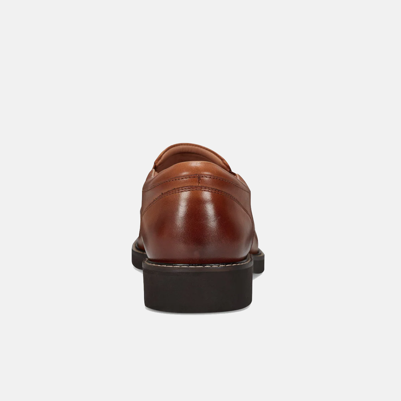 Rockport Folton Almond Toe Slip On shoes in brown leather with a polished finish, back view showing heel and stitching details.