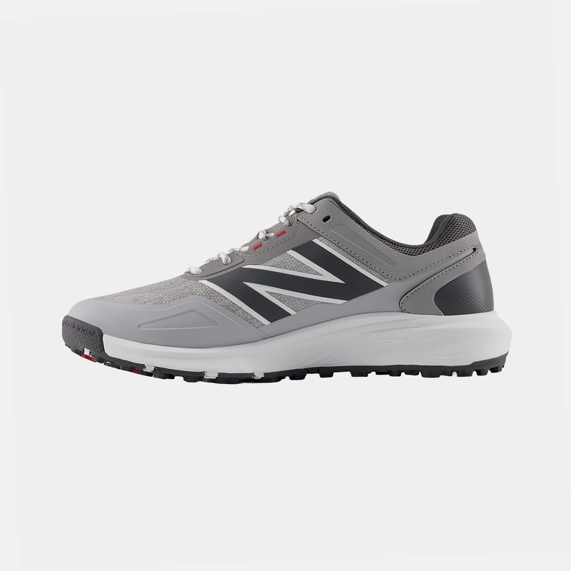 New Balance Golf Fresh Foam Contend v3 golf shoes in gray with mesh upper, Fresh Foam midsole, and spiked outsole, side view.