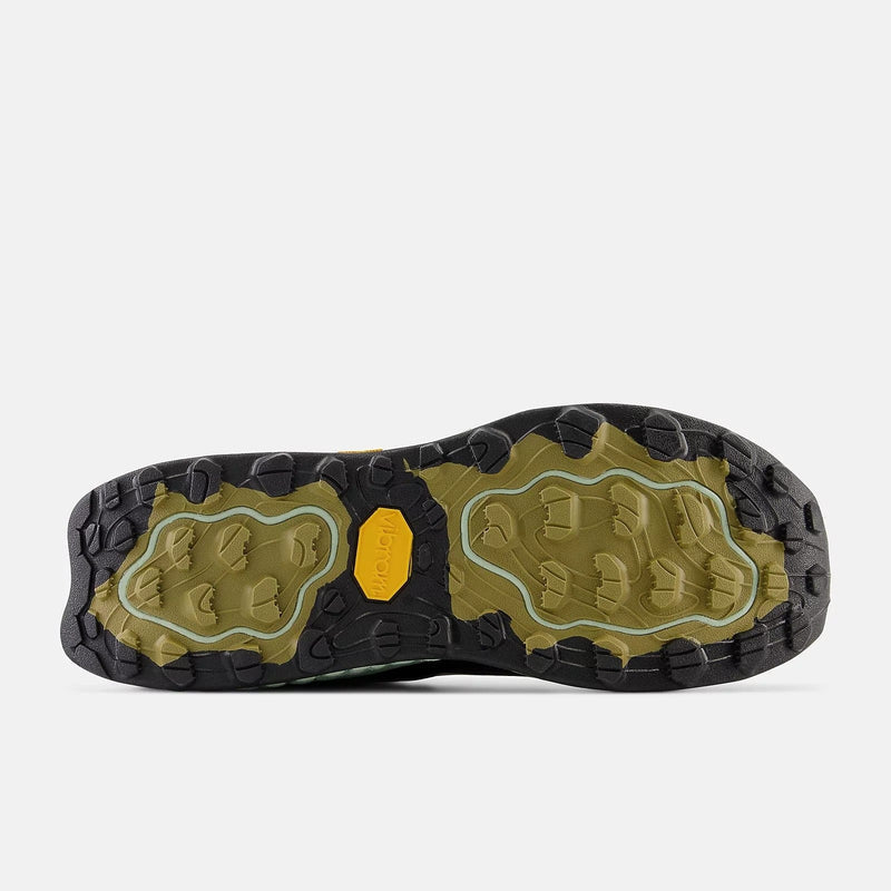 New Balance Fresh Foam Hierro v7 trail running shoes outsole with Vibram grip, lugged design in olive green and black rubber, sole view.