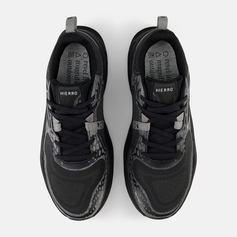 New Balance Fresh Foam Hierro v8 trail running shoes in black with gray accents and mesh upper, top view showing laces and interior details.