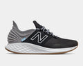New Balance Fresh Foam Roav Tee Shirt running shoes in black and gray with mesh upper, Fresh Foam midsole, and gum outsole, side view.