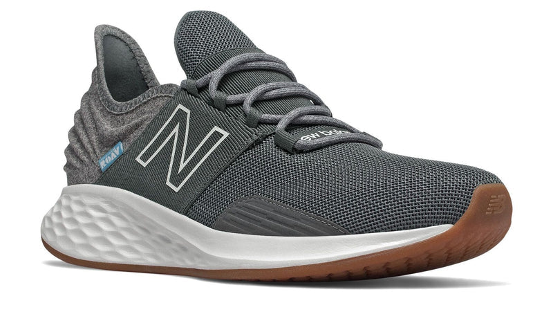 New Balance Fresh Foam Roav Tee Shirt running shoes in dark gray with mesh upper, Fresh Foam midsole, and gum rubber outsole, front-side angle.