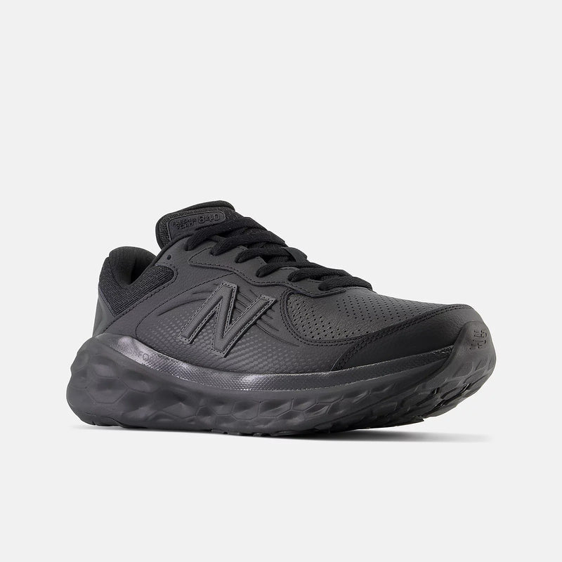 New Balance Fresh Foam X 840F Slip Resistant shoes in all-black with mesh upper, cushioning midsole, and slip-resistant outsole, angled front view.