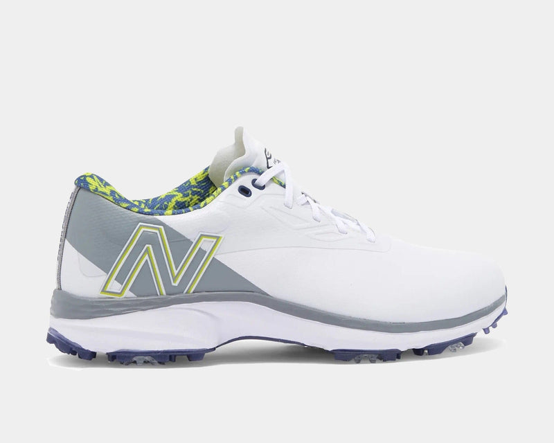 New Balance Golf Fresh Foam X Defender golf shoes in white with gray accents, Fresh Foam cushioning, and spiked outsole, side view.
