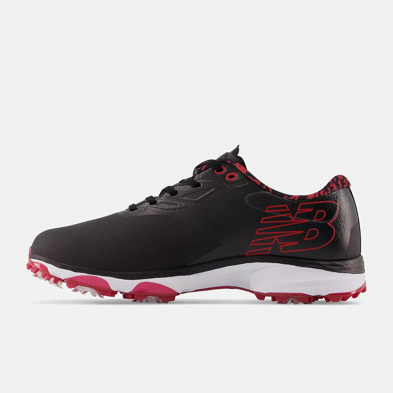 New Balance Golf Fresh Foam X Defender golf shoes in black with red accents, Fresh Foam cushioning, and spikeless outsole, side view.