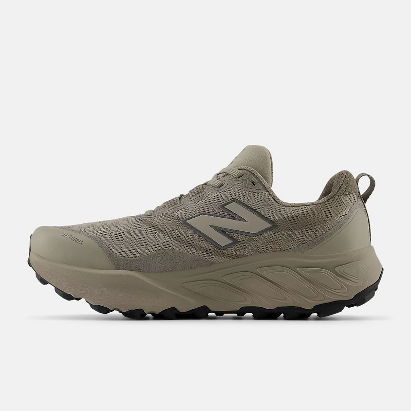 New Balance Fresh Foam X Hierro v9 trail running shoes in taupe with mesh upper and durable toe protection, side view.