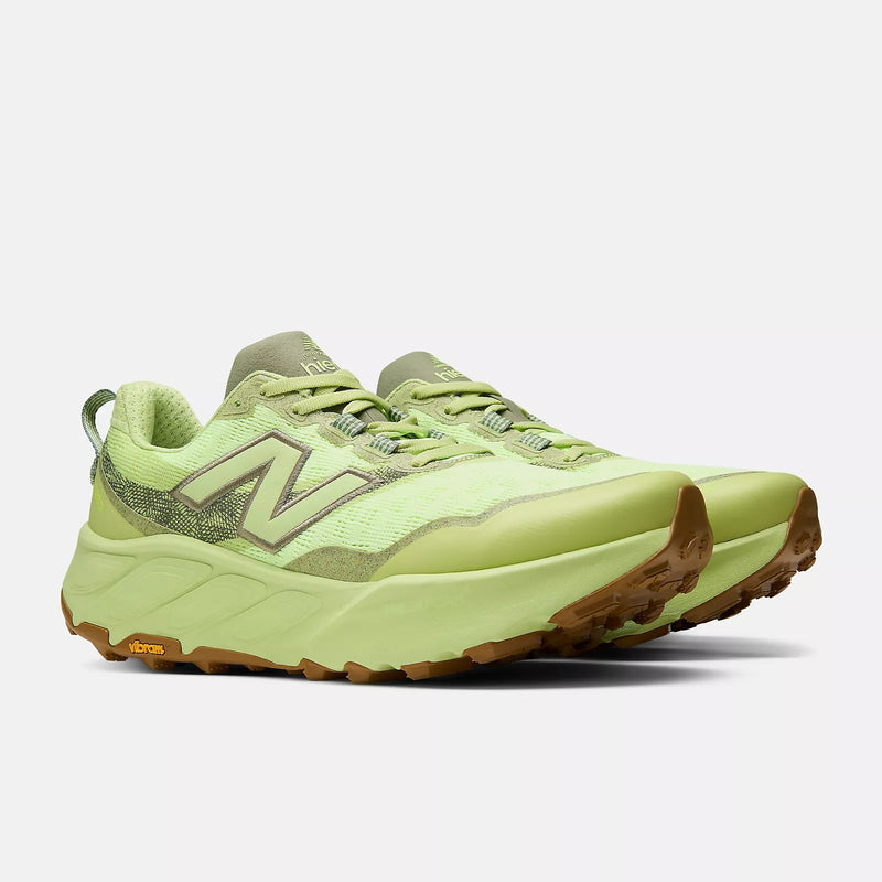 New Balance Fresh Foam X Hierro v9 trail running shoes in light green with Vibram outsole and mesh upper, front side view.