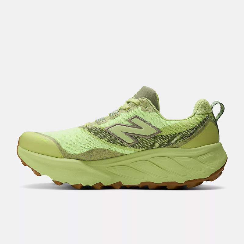 New Balance Fresh Foam X Hierro v9 trail running shoes in neon green with breathable mesh upper and rugged outsole, side view.