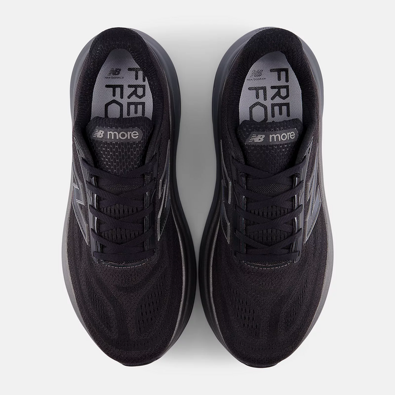 New Balance Fresh Foam X More v6 running shoes in black with engineered mesh upper and lace-up design, top view showing insole branding.