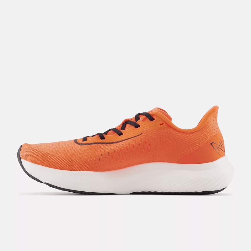 New Balance FuelCell Rebel v3 running shoes in vibrant orange with a breathable mesh upper, black laces, and lightweight white midsole, side view.
