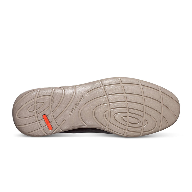 Rockport Garett Plain Toe outsole in beige rubber featuring textured grip pattern and orange accent detailing.