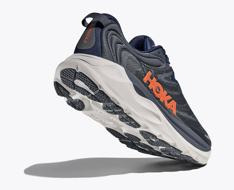 "HOKA Gaviota 6 running shoes in navy with orange logo, breathable mesh upper, and cushioned white outsole, angled bottom view"