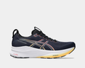 Asics Gel-Kayano 32 running shoes, side view in navy blue with yellow-to-orange gradient midsole, PureGEL cushioning, and breathable mesh upper.