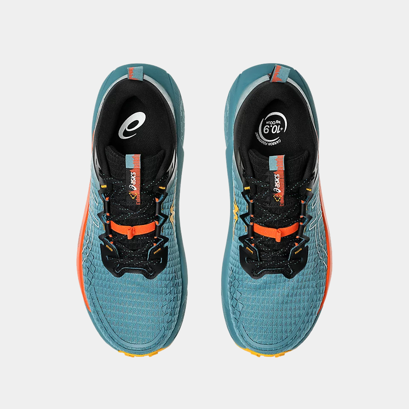 Asics Gel Trabuco 13 trail running shoes top view in teal blue with black and orange lace system, durable mesh upper.