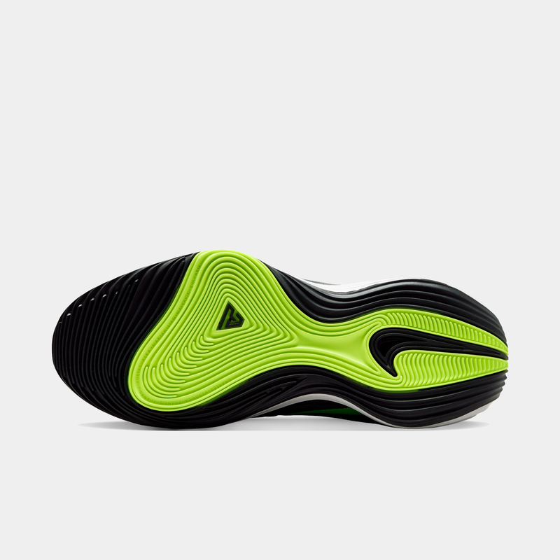 Nike Giannis Immortality 5 basketball shoes outsole featuring textured black and neon green rubber with wavy grooves.