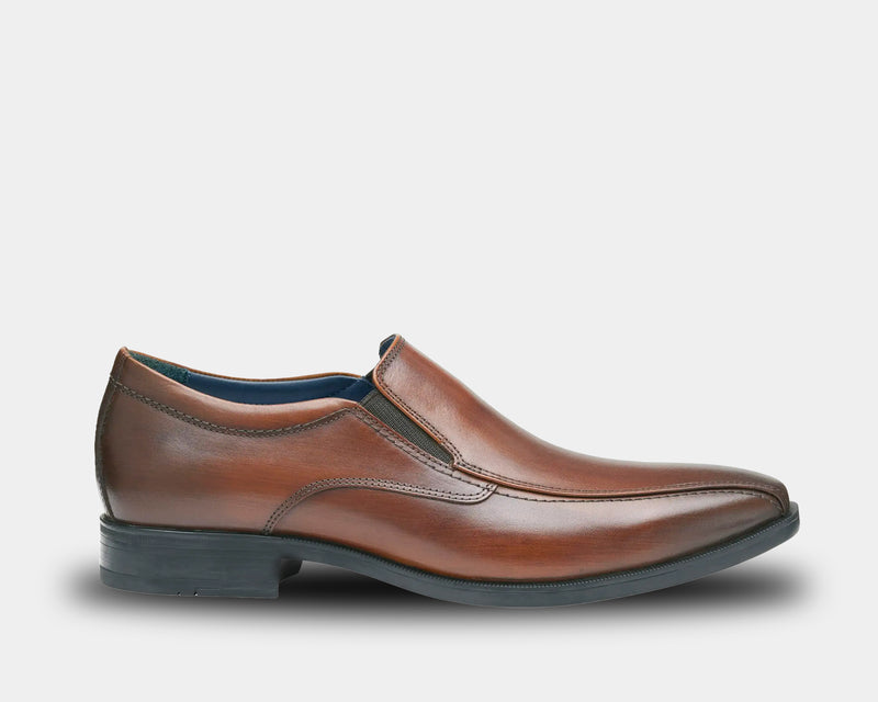 A brown, hand-finished, full grain upper shoe with a blue lined interior and a durable rubber outsole.