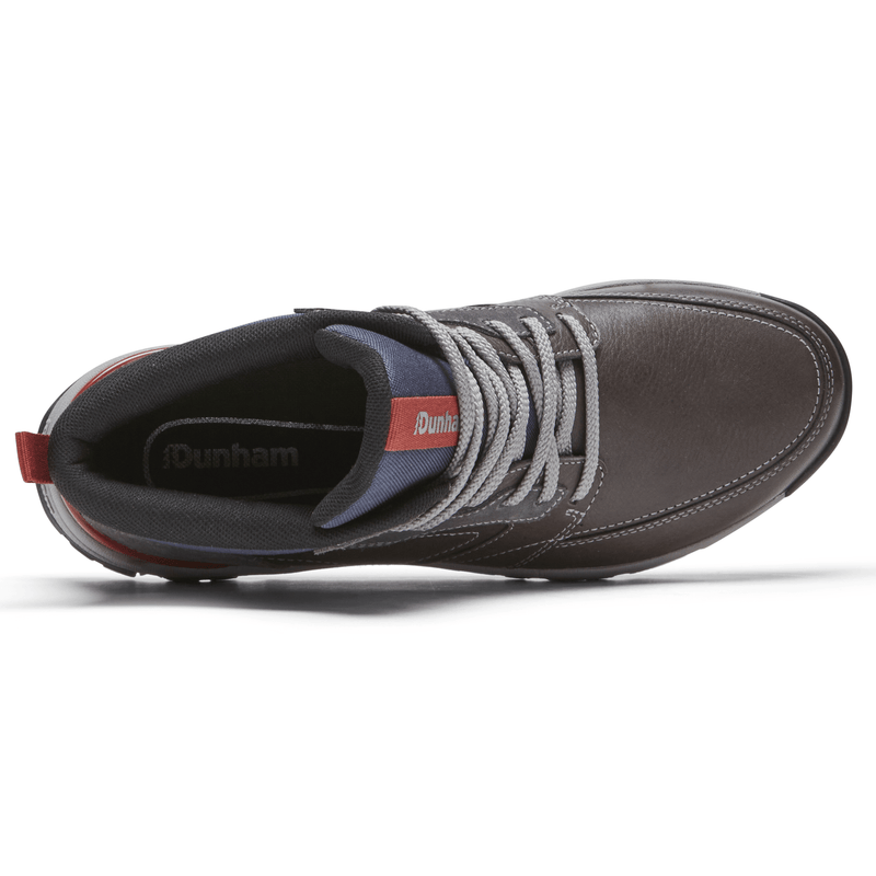 Dunham Glastonbury Mid Waterproof shoes top view showing brown leather upper, gray laces, padded collar, and red pull tab.