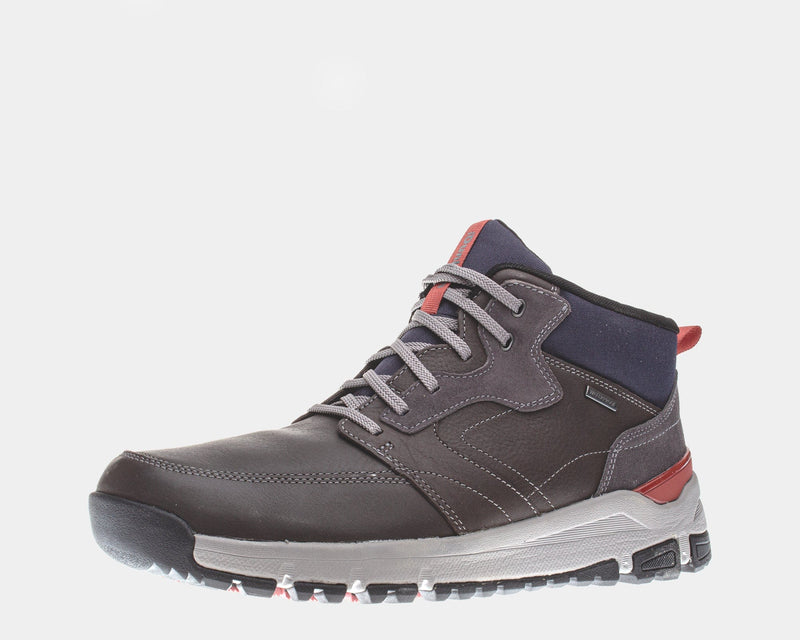 Dunham Glastonbury Mid Waterproof hiking boots in dark brown leather with navy accents, gray laces, and rugged outsole, side view.