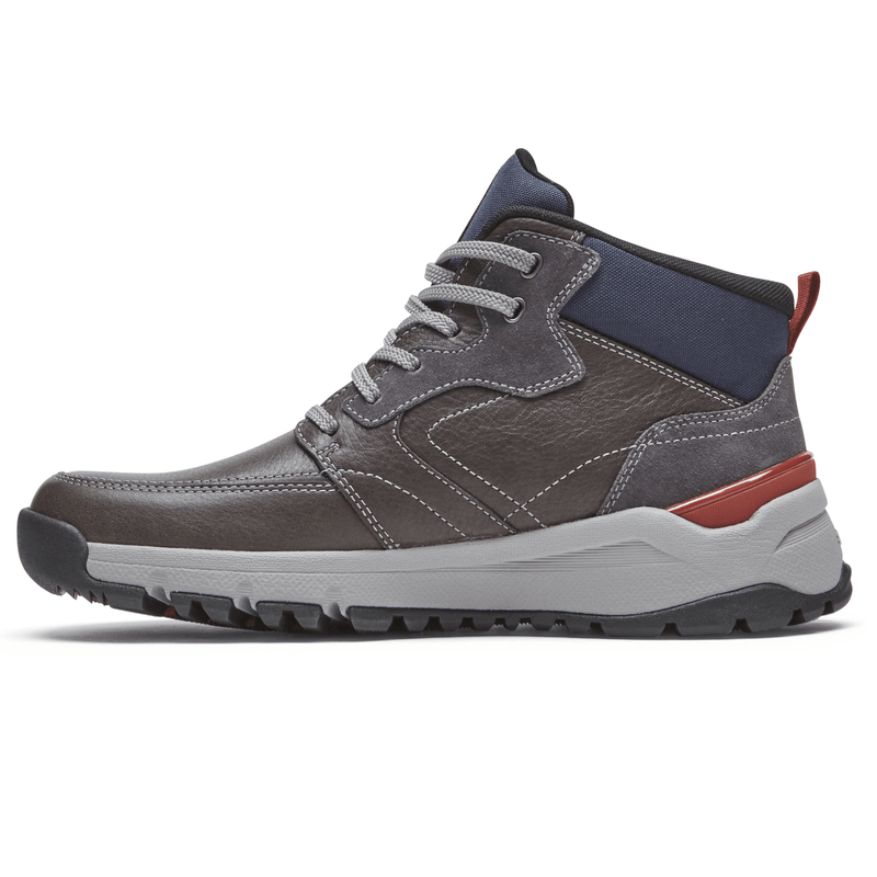 Dunham Glastonbury Mid Waterproof hiking boots in dark gray leather with navy textile collar and rust accents, side profile view.