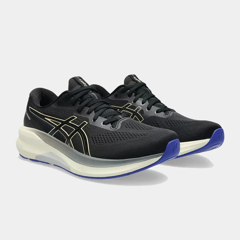 Asics GT-4000 4 running shoes in black with gold accents, breathable mesh upper, and cushioned sole featuring blue outsoles, front angle view.