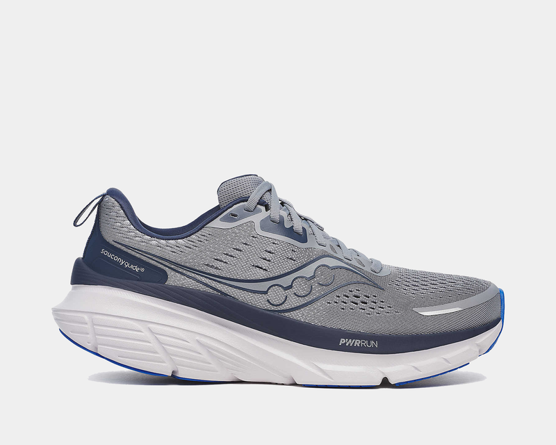 Saucony Guide 18 running shoes in gray with navy accents, engineered mesh upper, PWRRUN midsole, and side view.