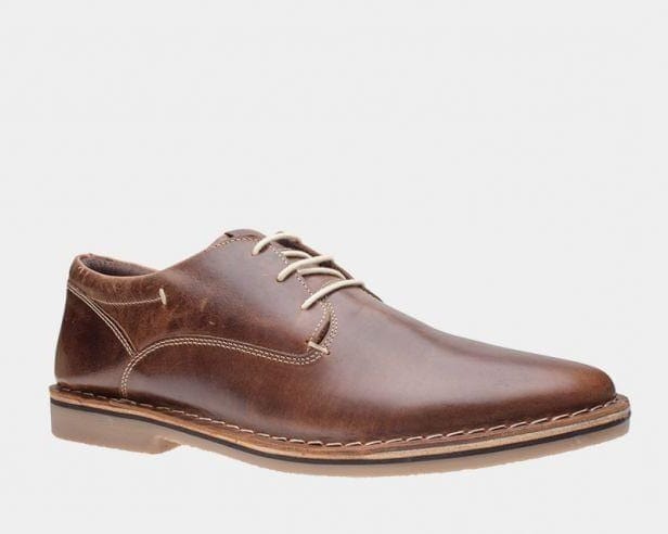 Steve Madden Harpoon oxford shoes in brown leather with stitched detailing and beige laces, side view.