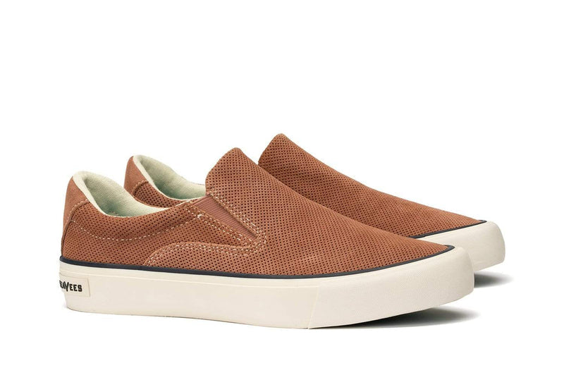 SeaVees Hawthorne Slip On shoes in rust brown suede with perforated design, white rubber outsole, and side view showcasing slip-on style.