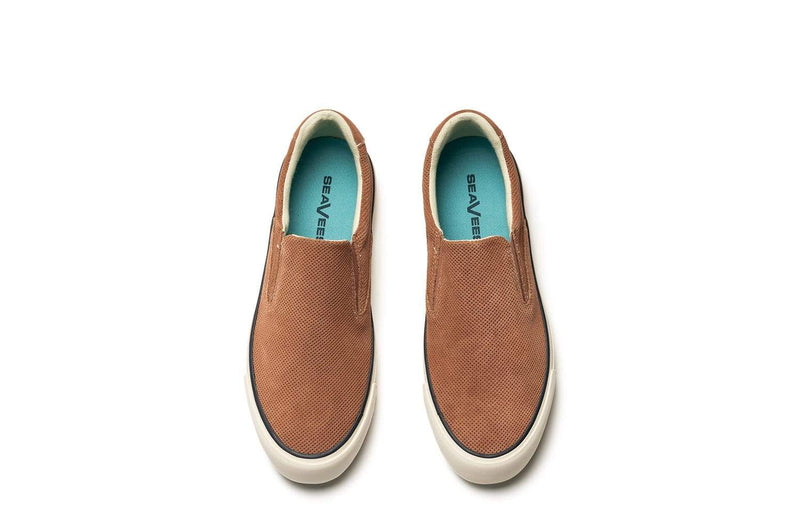 SeaVees Hawthorne Slip On shoes in tan suede with perforated design and white rubber outsole, top view.