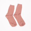 Her Socks in Desert Rose
