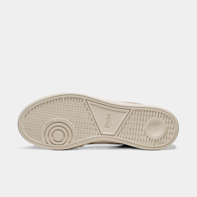 Polo Ralph Lauren Heritage Aera Leather-Suede shoe outsole in beige with textured tread pattern and embossed logo design, bottom view.