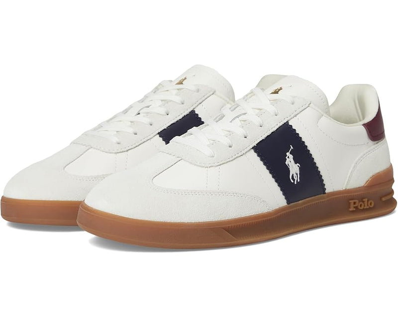 Polo Ralph Lauren Heritage Aera Sneakers in white with navy side stripe, gum sole, and signature brand logo, front angle view.