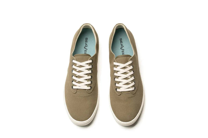 SeaVees Hermosa sneakers in olive green canvas with white laces and light blue insoles, top view.