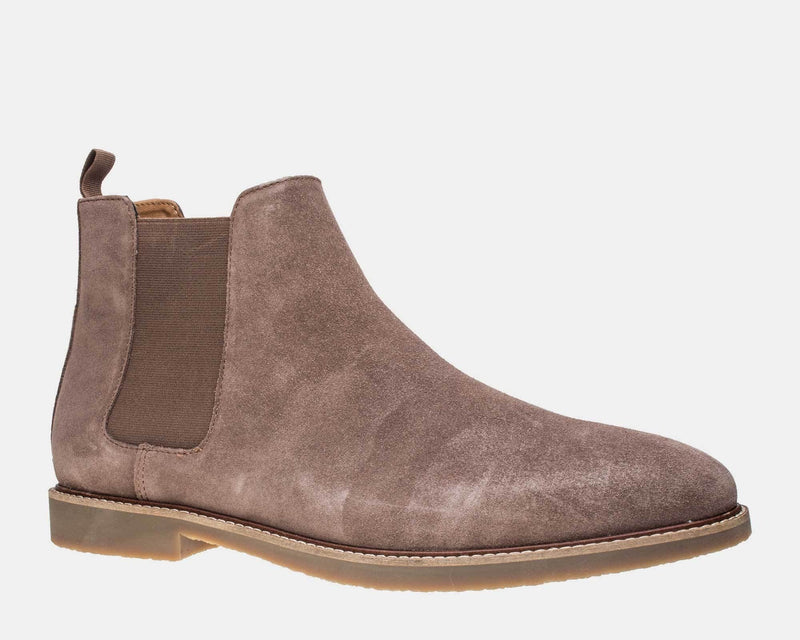 Steve Madden Highline Chelsea Boot in taupe suede with elastic side panel and pull tab, side view.