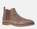 Steve Madden Highline Chelsea Boot in taupe suede with elastic side panel and pull tab, side view.