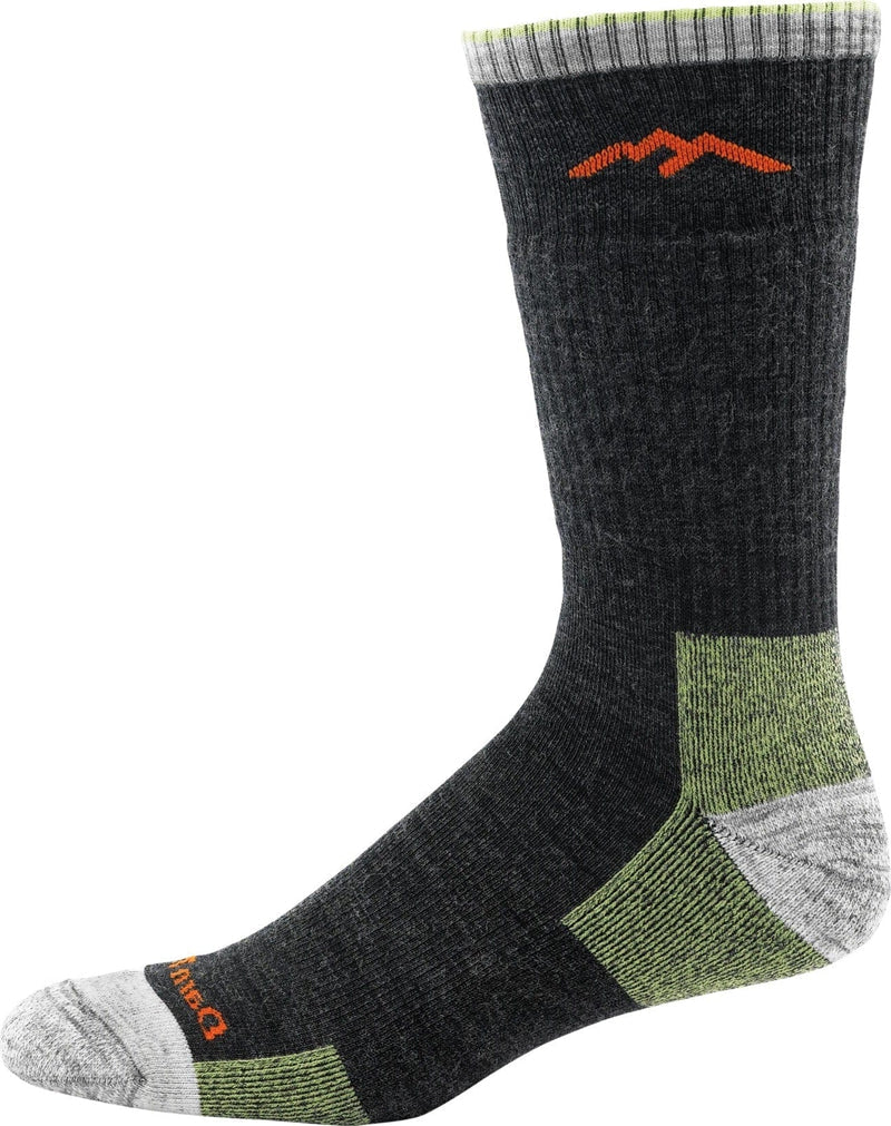 Darn Tough Hiker Boot Midweight Hiking socks in dark gray with green cushioning, reinforced heel and toe, and orange mountain logo, side view.