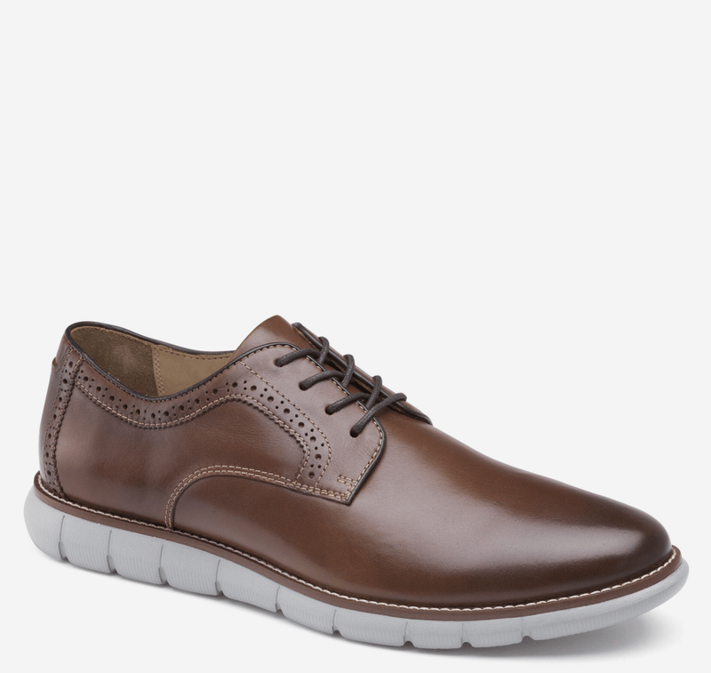 Johnston & Murphy Holden Plain Toe shoes in brown leather with brogue accents and white cushioned outsole, side view.