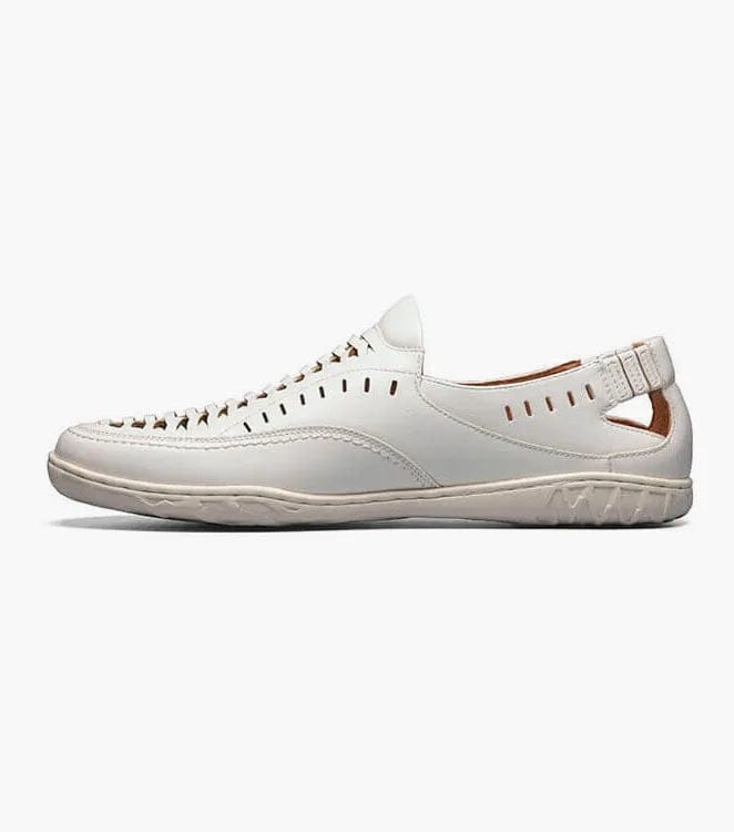 Stacy Adams Ibiza casual shoes in white leather with perforated details, elastic strap, and textured sole, side view.