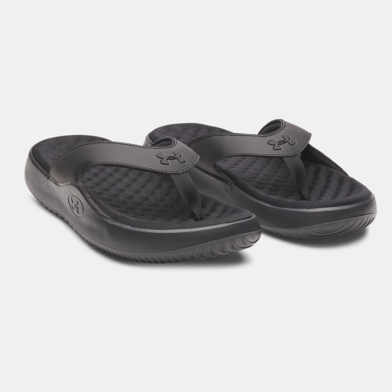 Under Armour Ignite Pro 8 T sandals in black with padded footbeds and textured straps, angled front side view.