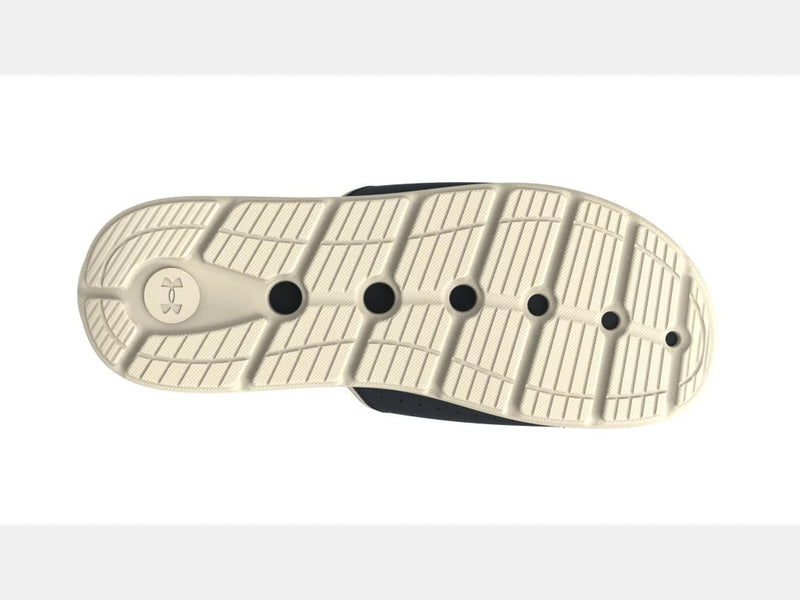 Under Armour Ignite Pro Olympus SL sandal outsole showing beige textured footbed with ventilation holes and logo detailing.