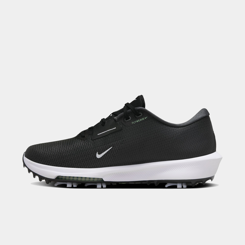 Nike Infinity Tour 2 golf shoes in black with Flyknit upper, white midsole, and integrated cleats, side view.