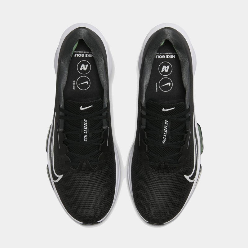 Nike Infinity Tour 2 golf shoes in black with white accents and mesh upper, top view showcasing lace system.