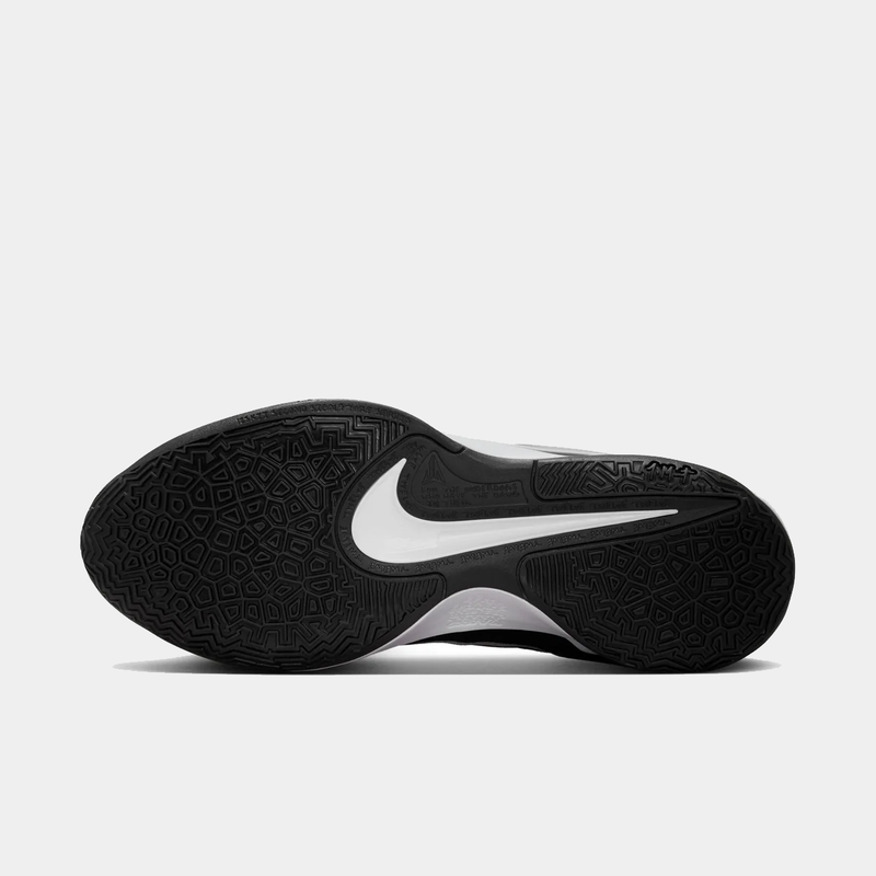 Nike Ja 2 basketball shoes outsole in black rubber with multidirectional traction pattern and white Nike Swoosh.